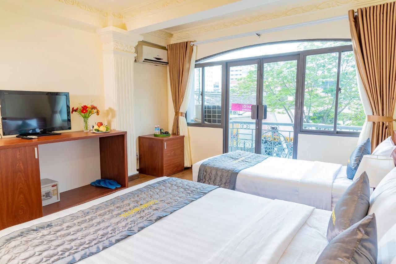 Cosmo Square Hotel Cidade de Ho Chi Minh Exterior foto