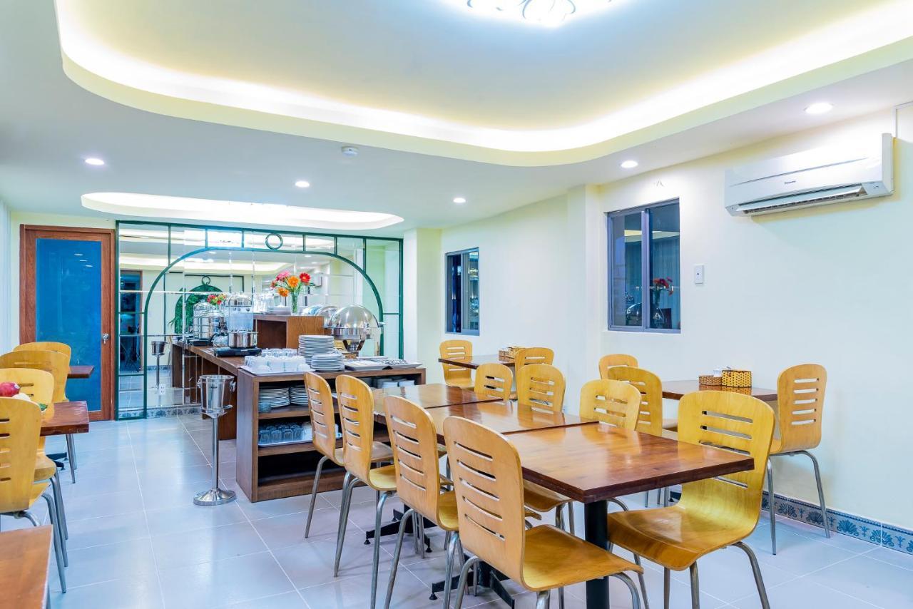 Cosmo Square Hotel Cidade de Ho Chi Minh Exterior foto