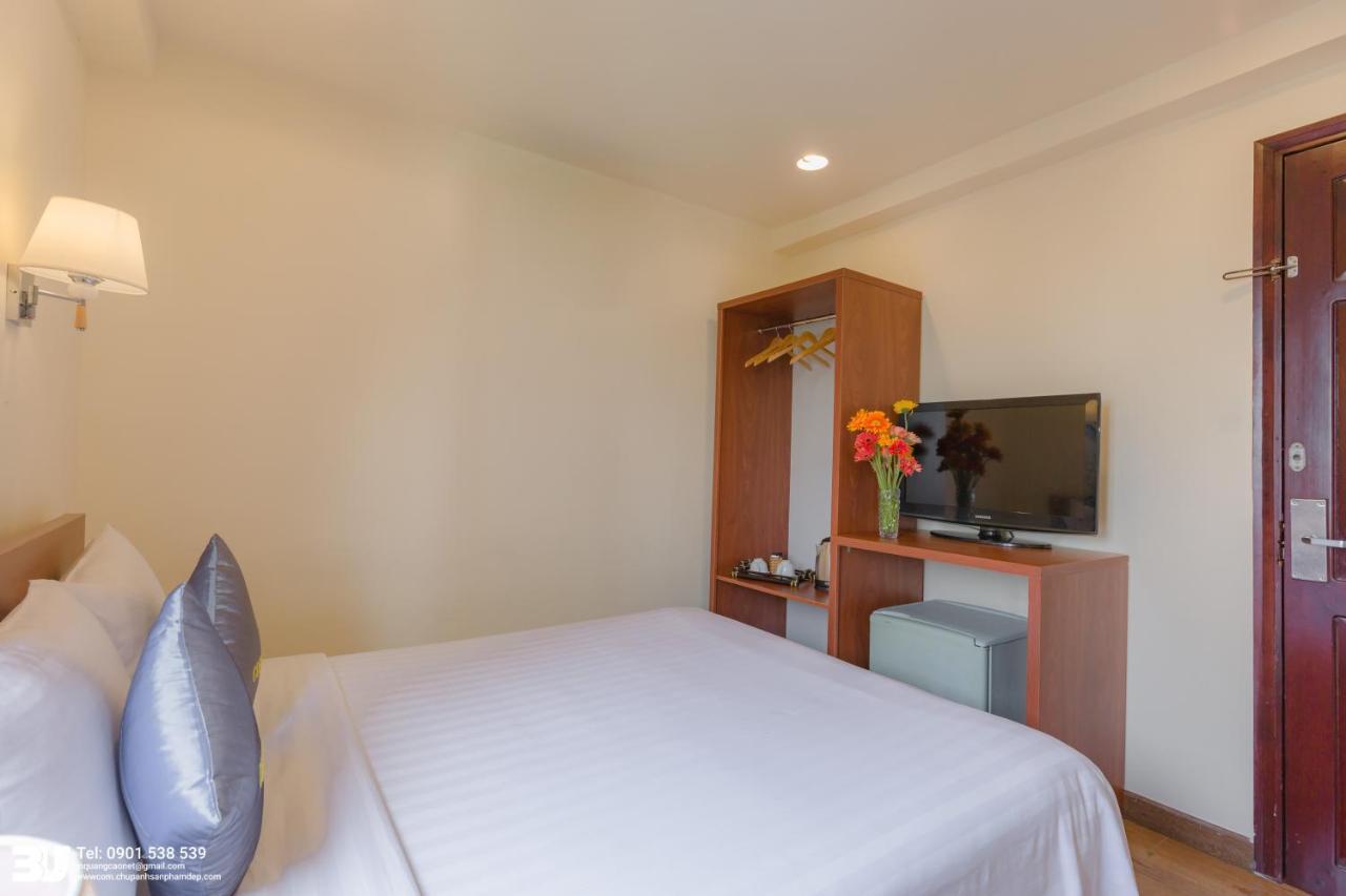 Cosmo Square Hotel Cidade de Ho Chi Minh Exterior foto